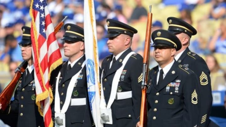 May 25, 2015; Los Angeles, CA, USA; Members of the military color guard prior to the game between the Los Angeles Dodgers and the Atlanta Braves at Dodger Stadium. Mandatory Credit: Jayne Kamin-Oncea-USA TODAY Sports