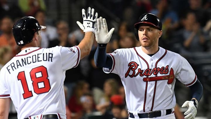 May 10, 2016; Atlanta, GA, USA; Atlanta Braves first baseman Freddie Freeman (5) reacts with left fielder Jeff Francoeur (18) after hitting a home run against the Philadelphia Phillies during the ninth inning at Turner Field. The Phillies defeated the Braves 3-2. Mandatory Credit: Dale Zanine-USA TODAY Sports May 10, 2016; Atlanta, GA, USA; Atlanta Braves first baseman Freddie Freeman (5) reacts with left fielder Jeff Francoeur (18) after hitting a home run against the Philadelphia Phillies during the ninth inning at Turner Field. The Phillies defeated the Braves 3-2. Mandatory Credit: Dale Zanine-USA TODAY Sports