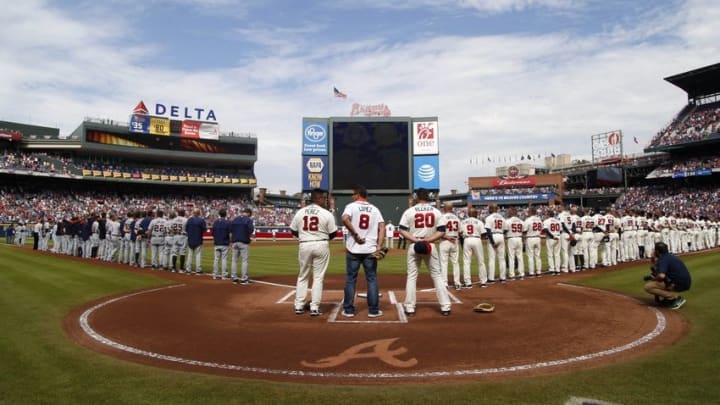 Oct 2, 2016; Atlanta, GA, USA; Atlanta Braves and Detroit Tigers players line up for the National Anthem before the final game at Turner Field. Mandatory Credit: Brett Davis-USA TODAY Sports