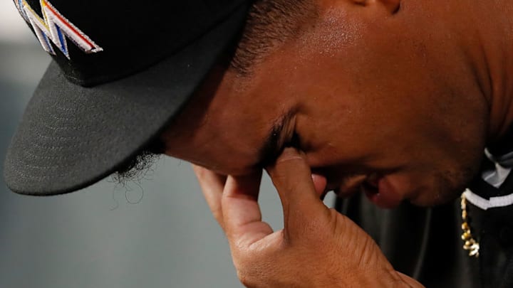 ATLANTA, GA - AUGUST 13: Merandy Gonzalez #77 of the Miami Marlins reacts after being pulled in the fifth inning against the Atlanta Braves during game two of a doubleheader at SunTrust Park on August 13, 2018 in Atlanta, Georgia. (Photo by Kevin C. Cox/Getty Images)