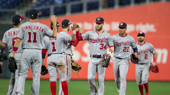 PHILADELPHIA, PA - SEPTEMBER 12: Ryan Zimmerman #11, Anthony Rendon #6, Wilmer Difo #1, Trea Turner #7, Bryce Harper #34, Juan Soto #22, and Adam Eaton #2 of the Washington Nationals high five one another after defeating the Philadelphia Phillies at Citizens Bank Park on September 12, 2018 in Philadelphia, Pennsylvania. The Nationals defeated the Phillies 5-1. (Photo by Mitchell Leff/Getty Images) PHILADELPHIA, PA - SEPTEMBER 12: Ryan Zimmerman #11, Anthony Rendon #6, Wilmer Difo #1, Trea Turner #7, Bryce Harper #34, Juan Soto #22, and Adam Eaton #2 of the Washington Nationals high five one another after defeating the Philadelphia Phillies at Citizens Bank Park on September 12, 2018 in Philadelphia, Pennsylvania. The Nationals defeated the Phillies 5-1. (Photo by Mitchell Leff/Getty Images)