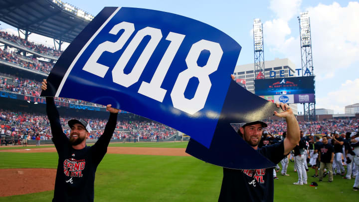 ATLANTA, GA – SEPTEMBER 22: Ender Inciarte #11 and Charlie Culberson #16 of the Atlanta Braves celebrate after clinching the NL East Division against the Philadelphia Phillies at SunTrust Park on September 22, 2018 in Atlanta, Georgia. (Photo by Daniel Shirey/Getty Images)