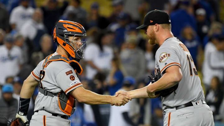LOS ANGELES, CA – APRIL 01: Will  Smith #13 gets a hand shake from Buster Posey #28 of the San Francisco Giants after earning a save in the ninth inning against the Los Angeles Dodgers at Dodger Stadium on April 1, 2019 in Los Angeles, California. (Photo by Jayne Kamin-Oncea/Getty Images)