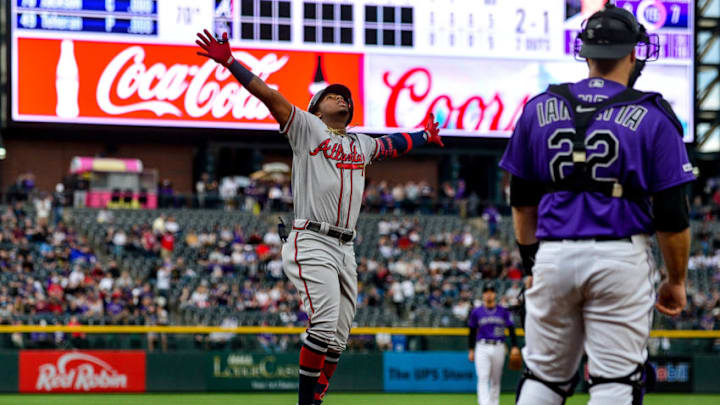 DENVER, CO - APRIL 8: Atlanta Braves left fielder Ronald Acuna Jr. #13 celebrates after hitting a first inning 2-run homerun against the Colorado Rockies during a game at Coors Field on April 8, 2019 in Denver, Colorado. (Photo by Dustin Bradford/Getty Images)
