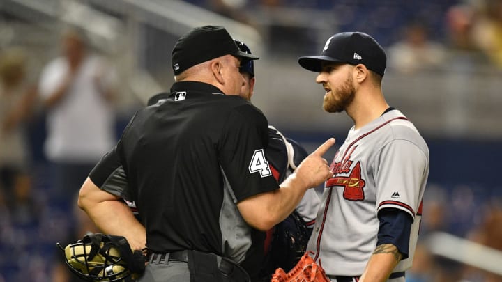 MIAMI, FL – MAY 03: Kevin Gausman #45 of the Atlanta Braves is ejected from the game by umpire Jeff Nelson #45 after throwing at Jose Urena #62 of the Miami Marlins in the second inning at Marlins Park on May 3, 2019 in Miami, Florida. (Photo by Mark Brown/Getty Images)