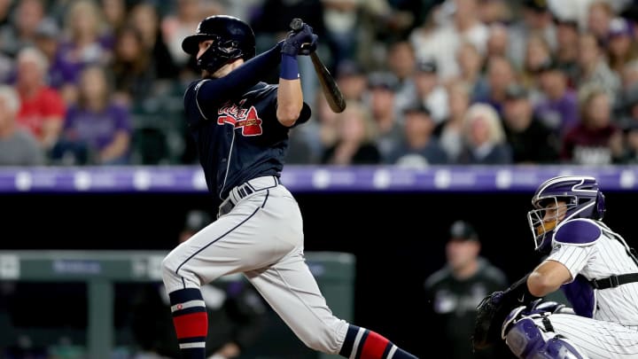 DENVER, COLORADO – APRIL 09: Dansby  Swanson #7 of the Atlanta Braves hits a 3 RBI home run in the fourth inning against the Colorado Rockies at Coors Field on April 09, 2019 in Denver, Colorado. (Photo by Matthew Stockman/Getty Images)