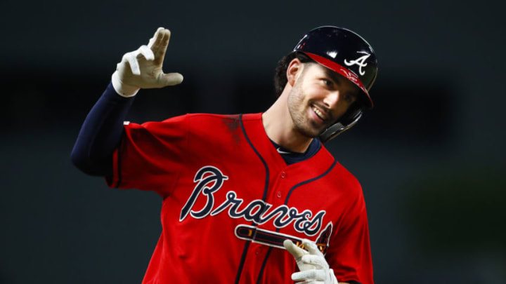 ATLANTA, GA - MAY 17: Dansby Swanson #7 of the Atlanta Braves reacts as he rounds third after hitting a three run home run in the sixth inning of an MLB game against the Milwaukee Brewers at SunTrust Park on May 17, 2019 in Atlanta, Georgia. (Photo by Todd Kirkland/Getty Images)