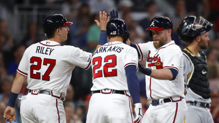 ATLANTA, GA – JUNE 11: Brian McCann #16 of the Atlanta Braves celebrates hitting a three run home run in the sixth inning with Austin Riley #27 and Nick Markakis #22 in an MLB game against the Pittsburgh Pirates at SunTrust Park on June 11, 2019 in Atlanta, Georgia. (Photo by Todd Kirkland/Getty Images)
