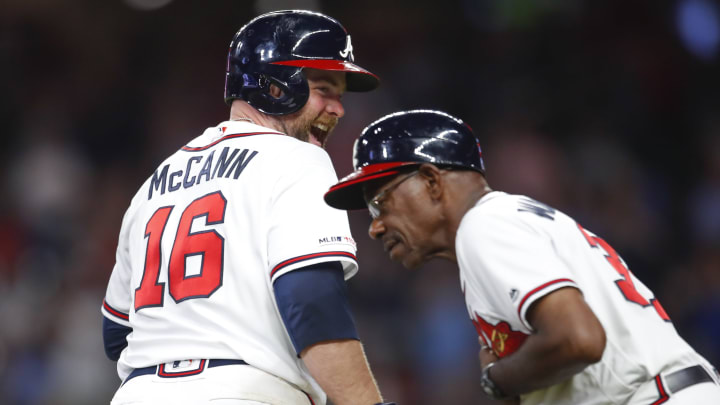 ATLANTA, GA – JUNE 17: Brian McCann #16 of the Atlanta Braves reacts as he rounds third with third base coach Ron Washington after hitting a home run in the eighth inning of an MLB game against the New York Mets at SunTrust Park on June 17, 2019 in Atlanta, Georgia. (Photo by Todd Kirkland/Getty Images)