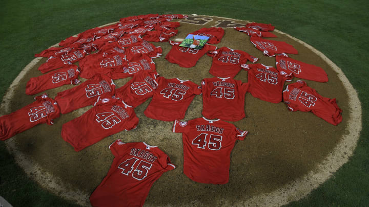ANAHEIM, CA – JULY 12: Los Angeles Angels of Anaheim players layed their jerseys on the pitchers mound after they won a combined no-hitter agasint the Seattle Mariners at Angel Stadium of Anaheim on July 12, 2019 in Anaheim, California. The entire Angels team wore Tyler Skaggs #45 jersey to honor him after his death on July 1. Angels won 13-0. (Photo by John McCoy/Getty Images)