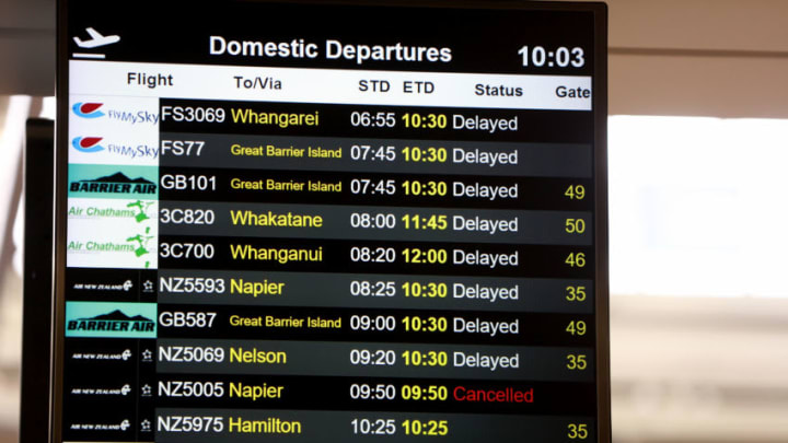 AUCKLAND, NEW ZEALAND - JUNE 14: Departure boards show cancelled or delayed flights out of Auckland as fog blankets Auckland Airport causing flight delays on June 14, 2019 in Auckland, New Zealand. For the second day in a row, a heavy fog hovers over Auckland Airport causing significant delays and cancellations. (Photo by Phil Walter/Getty Images)