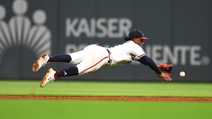 ATLANTA, GA – JULY 24: Ozzie Albies #1 of the Atlanta Braves dives for a sixth inning hit against the Kansas City Royals at SunTrust Park on July 24, 2019 in Atlanta, Georgia. (Photo by Scott Cunningham/Getty Images)