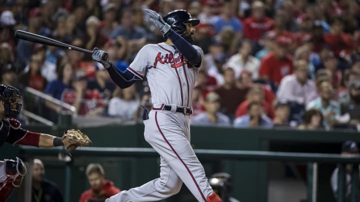 WASHINGTON, DC – SEPTEMBER 13: Nick  Markakis #22 of the Atlanta Braves hits a sacrifice fly against the Washington Nationals during the fifth inning at Nationals Park on September 13, 2019 in Washington, DC. (Photo by Scott Taetsch/Getty Images)