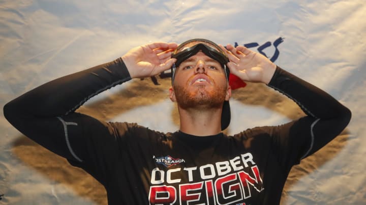 ATLANTA, GA – SEP 20: Freddie  Freeman #5 of the Atlanta Braves prepares to get into the festivities in the clubhouse at the conclusion of an MLB game against the San Francisco Giants in which they clinched the NL East at SunTrust Park on September 20, 2019 in Atlanta, Georgia. (Photo by Todd Kirkland/Getty Images)