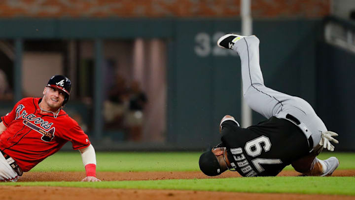 ATLANTA, GEORGIA - AUGUST 30: Josh Donaldson #20 of the Atlanta Braves is tagged out on a run down to second base by Jose Abreu #79 of the Chicago White Sox after a fly out by Charlie Culberson #8 in the eighth inning at SunTrust Park on August 30, 2019 in Atlanta, Georgia. (Photo by Kevin C. Cox/Getty Images) ATLANTA, GEORGIA - AUGUST 30: Josh Donaldson #20 of the Atlanta Braves is tagged out on a run down to second base by Jose Abreu #79 of the Chicago White Sox after a fly out by Charlie Culberson #8 in the eighth inning at SunTrust Park on August 30, 2019 in Atlanta, Georgia. (Photo by Kevin C. Cox/Getty Images)