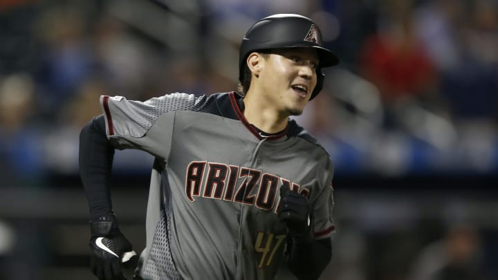 Wilmer Flores #41 of the Arizona Diamondbacks smiles as he runs the bases after his fifth inning home run against the New York Mets at Citi Field on September 09, 2019 in New York City. (Photo by Jim McIsaac/Getty Images)