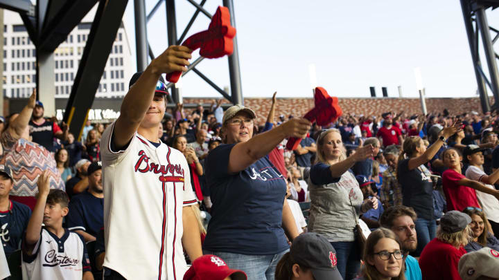 ATLANTA, GA – OCTOBER 9: Fans perform the tomahawk chant during Game Five of the National League Division Series between the Atlanta Braves and the St. Louis Cardinals at SunTrust Park on October 9, 2019 in Atlanta, Georgia. (Photo by Carmen Mandato/Getty Images)