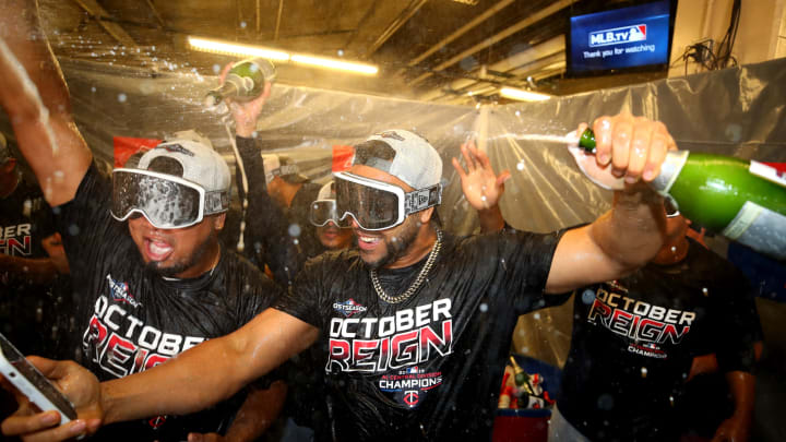 DETROIT, MICHIGAN – SEPTEMBER 25: Nelson  Cruz #23 of the Minnesota Twins celebrates winning the American League Central Division title after a 5-1 win against the Detroit Tigers and a Cleveland Indian loss at Comerica Park on September 25, 2019 in Detroit, Michigan. (Photo by Gregory Shamus/Getty Images)