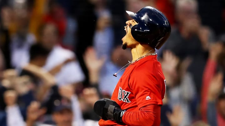BOSTON, MASSACHUSETTS – SEPTEMBER 29: Mookie  Betts #50 of the Boston Red Sox celebrates after scoring a run in the ninth inning to defeat the Baltimore Orioles 5-4 at Fenway Park on September 29, 2019 in Boston, Massachusetts. (Photo by Maddie Meyer/Getty Images)