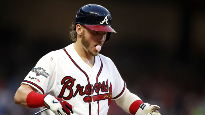ATLANTA, GEORGIA – OCTOBER 03: Josh Donaldson #20 of the Atlanta Braves reacts after being hit by the pitch during the sixth inning against the Atlanta Braves in game one of the National League Division Series at SunTrust Park on October 03, 2019 in Atlanta, Georgia. (Photo by Todd Kirkland/Getty Images)