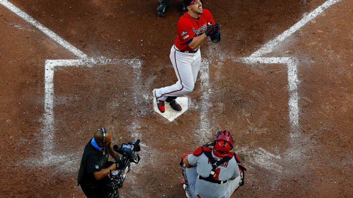 ATLANTA, GEORGIA – OCTOBER 04: Adam Duvall #23 of the Atlanta Braves crosses home plate after a two-run homer off Jack Flaherty #22 of the St. Louis Cardinals in the seventh inning in game two of the National League Division Series at SunTrust Park on October 04, 2019 in Atlanta, Georgia. (Photo by Kevin C. Cox/Getty Images)