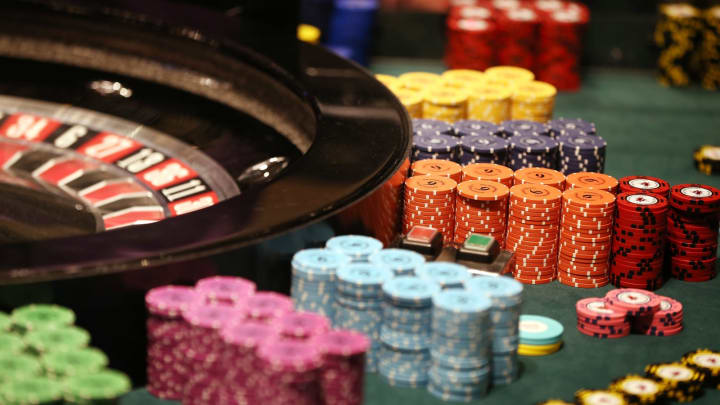 LONDON, ENGLAND – JULY 13: Chips pile up next to a roulette wheel at The Hippodrome Casino near Leicester Square on July 13, 2012 in London, England. (Photo by Peter Macdiarmid/Getty Images)