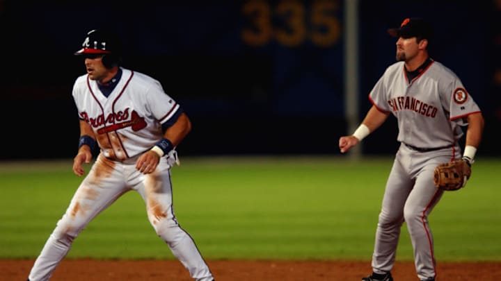 ATLANTA - OCTOBER 3: Short stop Mark DeRosa #16 of the Atlanta Braves leads off second base during Game two of the National League Divisional Series against the San Fransisco Giants on October 3, 2002 at Turner Field in Atlanta, Georgia. The Braves won 7-3. (Photo by Doug Pensinger/Getty Images)