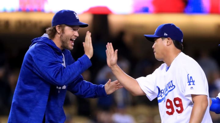 LOS ANGELES, CA – MAY 25: Hyun-Jin  Ryu #99 of the Los Angeles Dodgers celebrates a 7-3 win over the St. Louis Cardinals with Clayton  Kershaw #22 at Dodger Stadium on May 25, 2017 in Los Angeles, California. (Photo by Harry How/Getty Images)