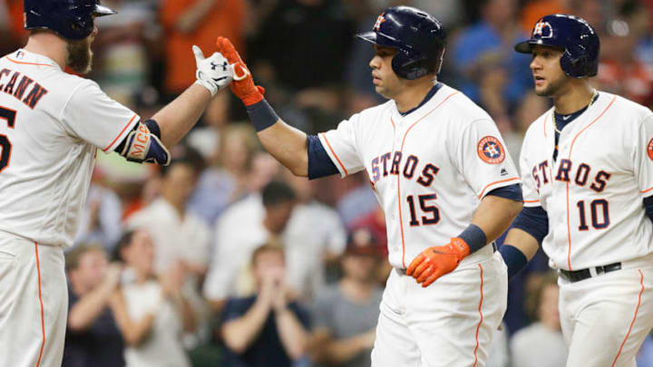 HOUSTON, TX - JULY 17: Carlos Beltran #15 of the Houston Astros receives a high five from Brian McCann #16 as Yuli Gurriel #10 looks on after hitting a two-run home run in the sixth inning against the Seattle Mariners at Minute Maid Park on July 17, 2017 in Houston, Texas. (Photo by Bob Levey/Getty Images) HOUSTON, TX - JULY 17: Carlos Beltran #15 of the Houston Astros receives a high five from Brian McCann #16 as Yuli Gurriel #10 looks on after hitting a two-run home run in the sixth inning against the Seattle Mariners at Minute Maid Park on July 17, 2017 in Houston, Texas. (Photo by Bob Levey/Getty Images)