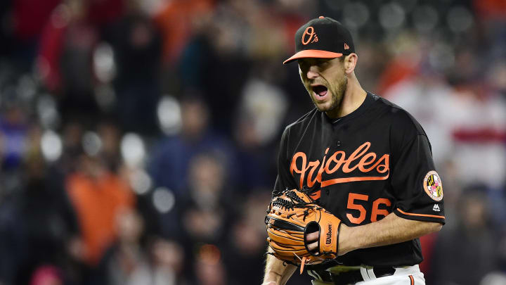 BALTIMORE, MD – APRIL 20: Darr en O’Day #56 of the Baltimore Orioles celebrates after the Orioles defeated the Cleveland Indians 3-1 at Oriole Park at Camden Yards on April 20, 2018 in Baltimore, Maryland. (Photo by Patrick McDermott/Getty Images)