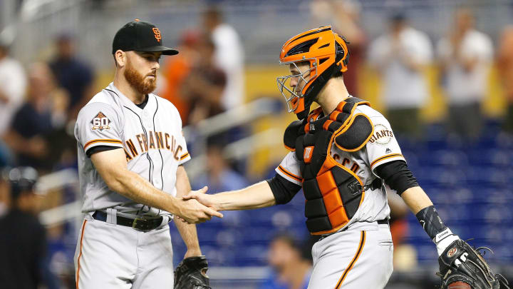 MIAMI, FL – JUNE 14: Sam Dyson #49 of the San Francisco Giants celebrates with Buster Posey #28 after they defeated the Miami Marlins 6-3 in 16 innings at Marlins Park on June 14, 2018 in Miami, Florida. (Photo by Michael Reaves/Getty Images)