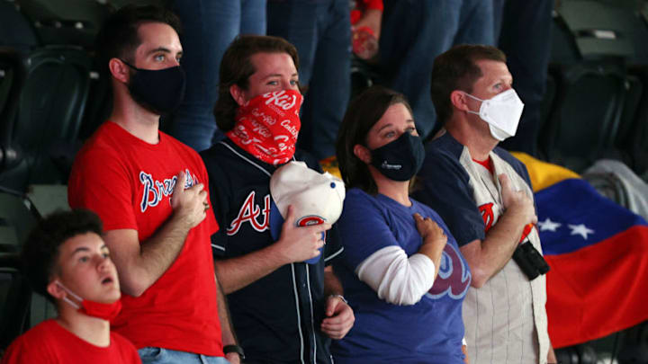 ARLINGTON, TEXAS - OCTOBER 18: Fans stand for the national anthem prior to Game Seven of the National League Championship Series between the Los Angeles Dodgers and the Atlanta Braves at Globe Life Field on October 18, 2020 in Arlington, Texas. (Photo by Ron Jenkins/Getty Images)