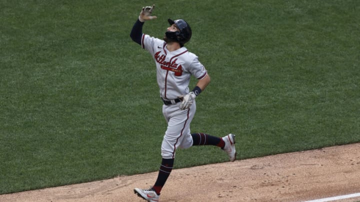 Atlanta Braves shortstop Dansby Swanson (7) throws the ball during