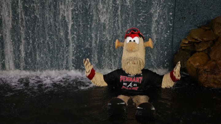 Even Blooper celebrates the Atlanta Braves' NLDS victory... but how do you dry out afterwards? (Photo by Kevin C. Cox/Getty Images)