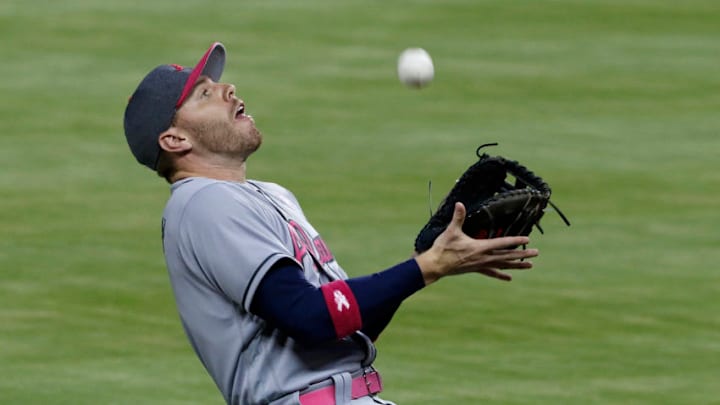 MIAMI, FL - MAY 13: First baseman Freddie Freeman #5 of the Atlanta Braves catches Atlanta Braves foul ball hits a by J.T. Realmuto #11 of the Miami Marlins in the third inning at Marlins Park on May 13, 2017 in Miami, Florida. (Photo by Joe Skipper/Getty Images)