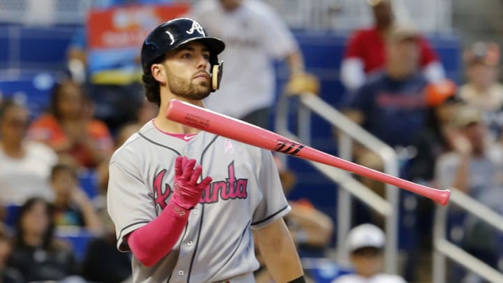 MIAMI, FL - MAY 13: Dansby Swanson #7 of the Atlanta Braves flips his bat as he struck out in the second inning against the Miami Marlins at Marlins Park on May 13, 2017 in Miami, Florida. Players are wearing pink to celebrate Mother's Day weekend and support breast cancer awareness (Photo by Joe Skipper/Getty Images)