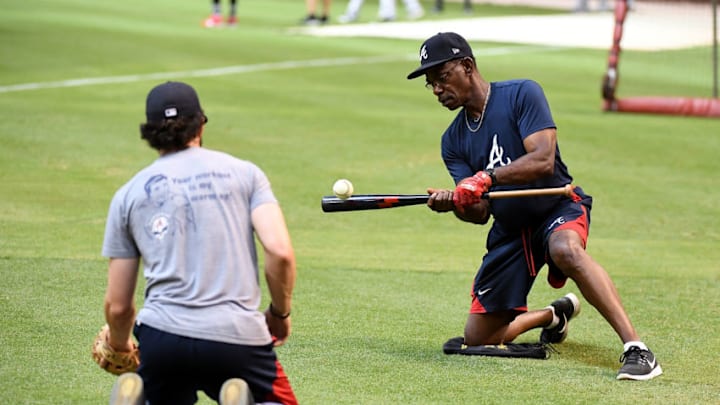 PHOENIX, AZ - JULY 24: Third base coach Ron Washington #37 of the Atlanta Braves hits short hoppers to Dansby Swanson #7 prior to a game against the Arizona Diamondbacks at Chase Field on July 24, 2017 in Phoenix, Arizona. (Photo by Norm Hall/Getty Images) PHOENIX, AZ - JULY 24: Third base coach Ron Washington #37 of the Atlanta Braves hits short hoppers to Dansby Swanson #7 prior to a game against the Arizona Diamondbacks at Chase Field on July 24, 2017 in Phoenix, Arizona. (Photo by Norm Hall/Getty Images)