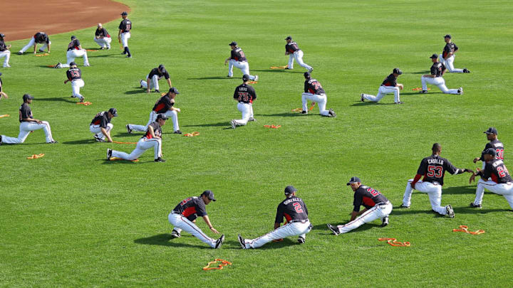 LAKE BUENA VISTA, FL - FEBRUARY 21: The Atlanta Braves stretch during a spring training workout at Champion Stadium on February 21, 2011 in Lake Buena Vista, Florida. (Photo by Mike Ehrmann/Getty Images)