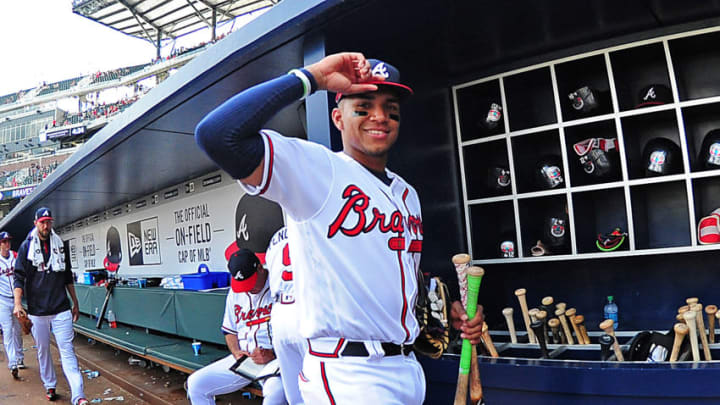 ATLANTA, GA - APRIL 16: Johan Camargo #17 of the Atlanta Braves heads to the locker room after registering his first MLB hit during the game against the San Diego Padres at SunTrust Park on April 16, 2017 in Atlanta, Georgia. (Photo by Scott Cunningham/Getty Images)