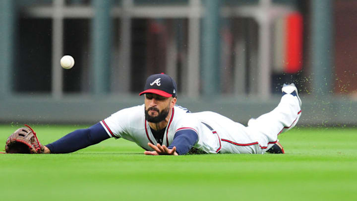 ATLANTA, GA - MAY 5: Nick Markakis #22 of the Atlanta Braves is unable to make a third inning diving catch against the San Francisco Giants at SunTrust Park on May 5, 2018 in Atlanta, Georgia. (Photo by Scott Cunningham/Getty Images)