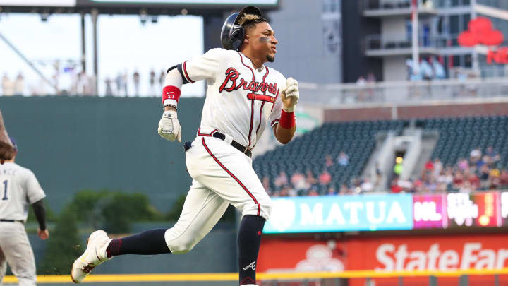ATLANTA, GA – APRIL 30: Johan Camargo #17 of the Atlanta Braves rounds third base to score on a ground ball hit by Matt Joyce #14 of the Atlanta Braves in the second inning during the game against the San Diego Padres at SunTrust Park on April 30, 2019 in Atlanta, Georgia. (Photo by Carmen Mandato/Getty Images)