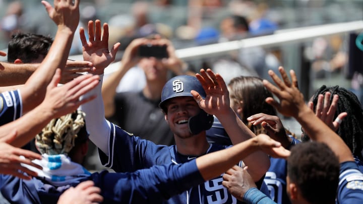 ATLANTA, GEORGIA – MAY 02: Wil Myers #4 of the San Diego Padres reacts after hitting a two-run homer in the sixth inning against the Atlanta Braves at SunTrust Park on May 02, 2019 in Atlanta, Georgia. (Photo by Kevin C. Cox/Getty Images).