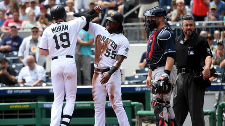 PITTSBURGH, PA - JUNE 06: Colin Moran #19 of the Pittsburgh Pirates celebrates with Josh Bell #55 after hitting a two run home run in the second inning during the game against the Atlanta Braves at PNC Park on June 6, 2019 in Pittsburgh, Pennsylvania. (Photo by Justin Berl/Getty Images)