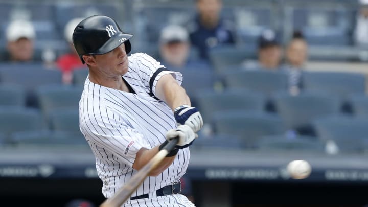NEW YORK, NEW YORK – AUGUST 18: DJ LeMahieu #26 of the New York Yankees connects on a ninth inning RBI single against the Cleveland Indians at Yankee Stadium on August 18, 2019 in New York City. (Photo by Jim McIsaac/Getty Images)