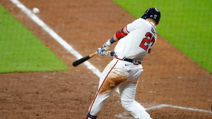 ATLANTA, GA - AUGUST 22: Austin Riley #27 of the Atlanta Braves hits a two-run home run in the seventh inning of an MLB game against the Philadelphia Phillies at Truist Park on August 22, 2020 in Atlanta, Georgia. (Photo by Todd Kirkland/Getty Images)