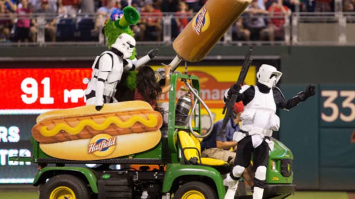Jul 21, 2016; Philadelphia, PA, USA; The Phillie Phanatic and star wars characters shoot hot dogs into the crowd during a break in the action between the Philadelphia Phillies and the Miami Marlins at Citizens Bank Park. The Miami Marlins won 9-3. Mandatory Credit: Bill Streicher-USA TODAY Sports