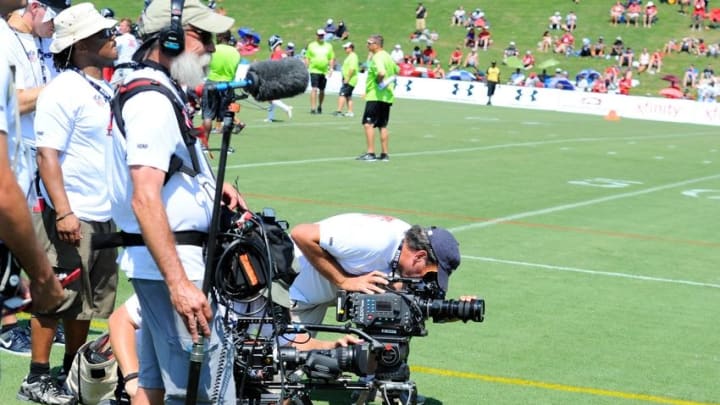 Jul 26, 2014; Atlanta, GA, USA; The Hard Knocks film crew prior films the Atlanta Falcons during training camp at Falcons Training Complex. Mandatory Credit: Dale Zanine-USA TODAY Sports
