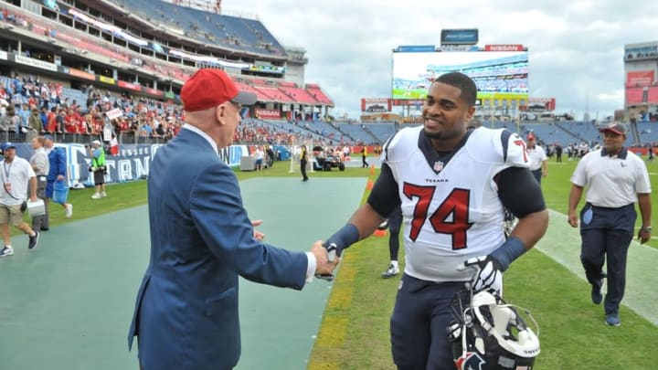 Dec 27, 2015; Nashville, TN, USA; Houston Texans owner Bob McNair greets Texans tackle Chris Clark (74) as he leaves the field following the game against the Tennessee Titans at Nissan Stadium. Houston won 34-6. Mandatory Credit: Jim Brown-USA TODAY Sports