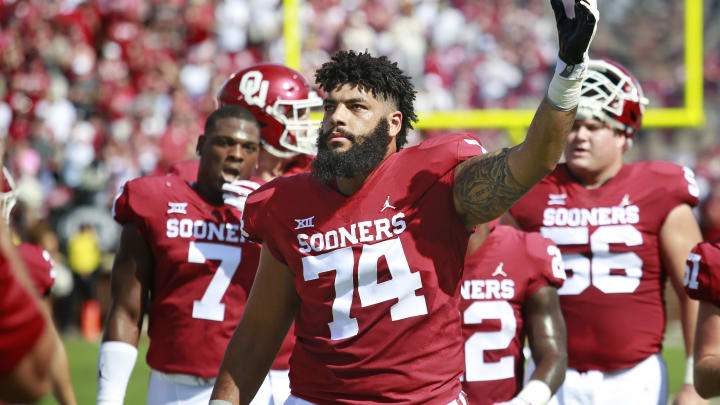 NORMAN, OK – SEPTEMBER 014: Offensive lineman Cody Ford #74 of the Oklahoma Sooners engages the crowd before the game against the Florida Atlantic Owls at Gaylord Family Oklahoma Memorial Stadium on September 1, 2018 in Norman, Oklahoma. The Sooners defeated the Owls 63-14. (Photo by Brett Deering/Getty Images)