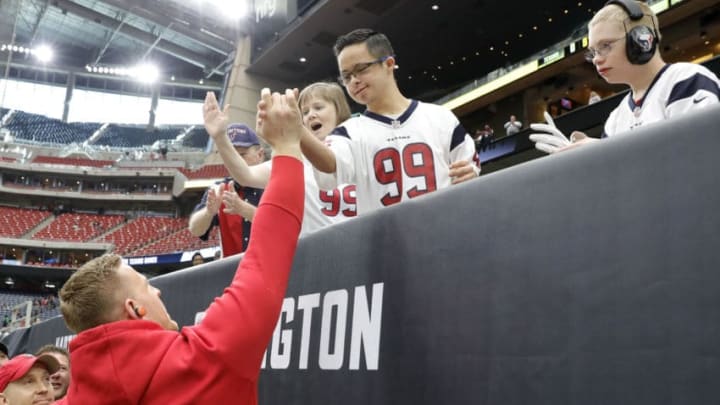 HOUSTON, TX - DECEMBER 02: J.J. Watt #99 of the Houston Texans greets fans before the game against the Cleveland Browns at NRG Stadium on December 2, 2018 in Houston, Texas. (Photo by Tim Warner/Getty Images)